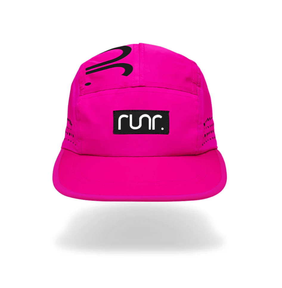 A bright pink running cap featuring a black logo on the front and ventilation holes on the sides.