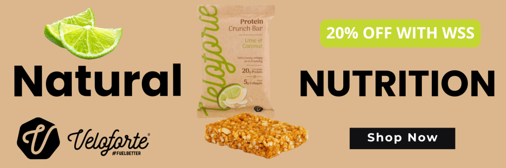 Promotional image for Veloferte protein crunch bar with lime and coconut flavor, featuring a natural theme and a discount offer.